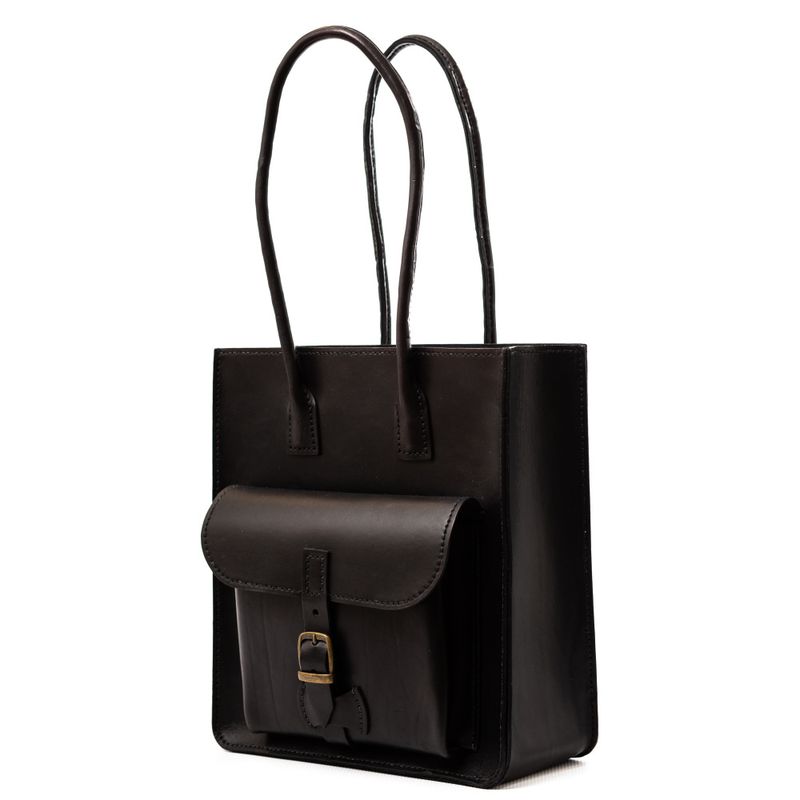 Håndsydd veske i okselær