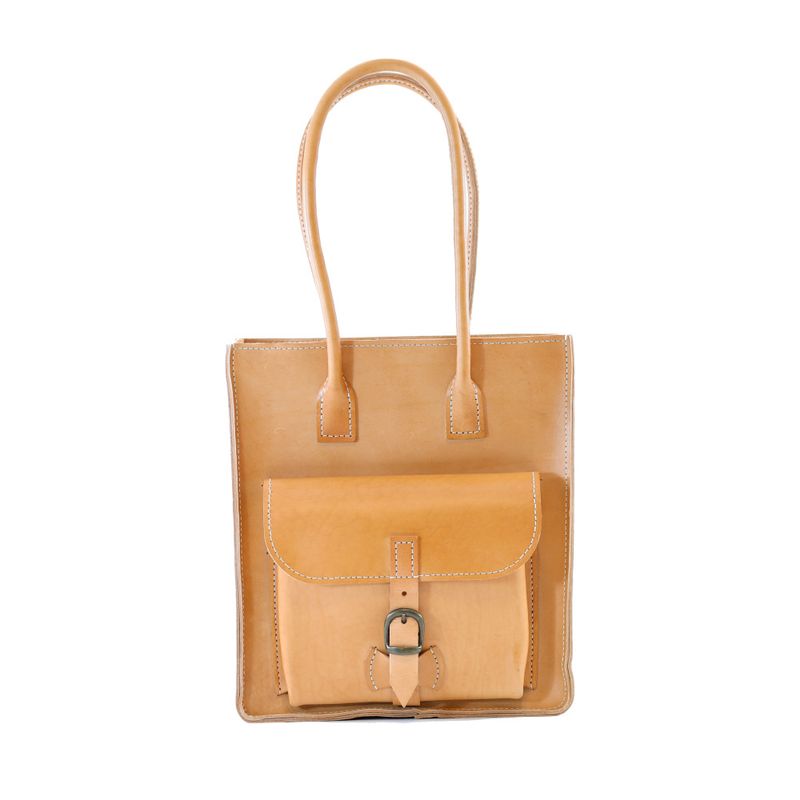 Håndsydd veske i okselær